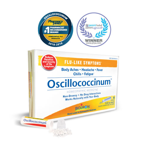 Oscillococcinum box and tube with pellets spilled out. Pharmacy Times #1 Homeopathic Flu Medicine and PTPA approved seal.